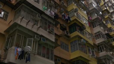 gün zaman hong kong şehir canlı blok binanın ön görünüm 4 k çini