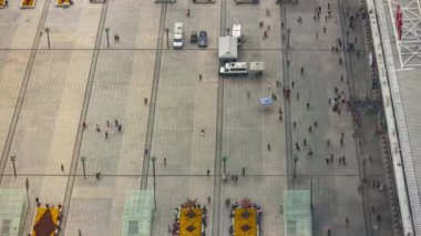 CHENGDU, CHINA - CIRCA 2019: Crowd walking at central square of modern city, timelapse 