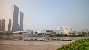 Gündüz vakti Changsha şehri ünlü uluslararası kültür ve sanat merkezi nehir kenarı havacılık zaman çizelgesi panorama 4k porseleni
