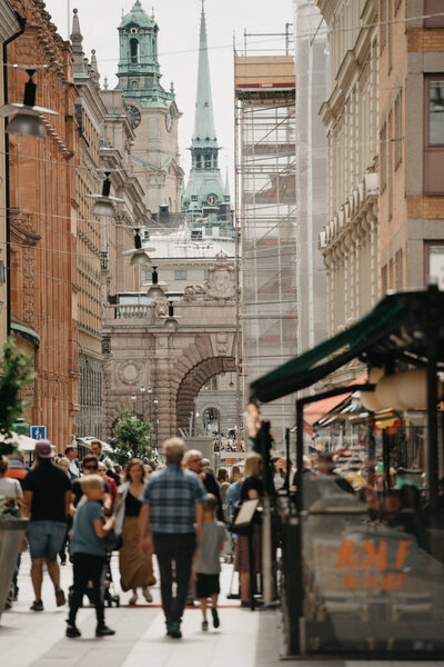 Busy ancient European street in the afternoon 