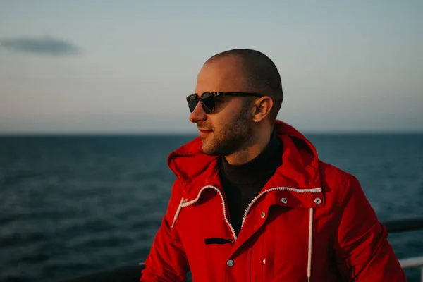 Bald Man Stubble Red Jacket Sunglasses Ship Looking Sunset Close — 스톡 사진