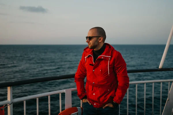 Bald Man Stubble Red Jacket Sunglasses Hands Jeans Pockets Smiles — 스톡 사진