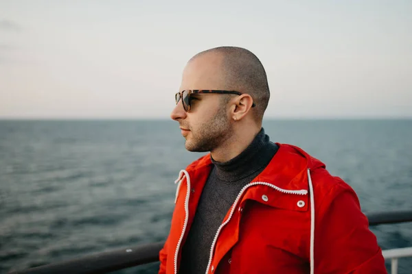 Stylish Bald Man Stubble Red Jacket Sunglasses Poses Ship Looking — 스톡 사진