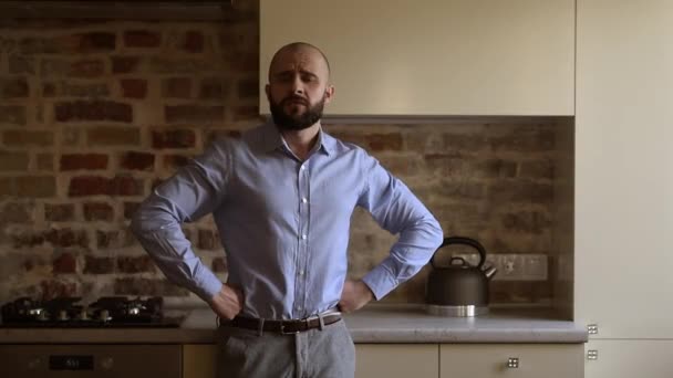 Bald Office Worker Beard Unhappy Puts His Hands His Waist — Stockvideo