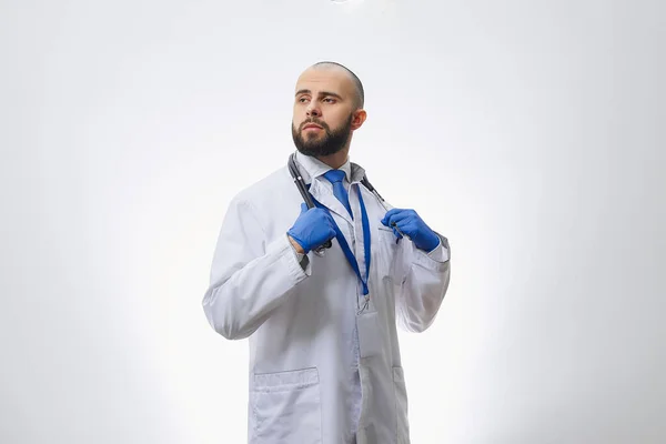 Doctor Poses Disposable Medical Gloves Holding Stethoscope Bald Physician Beard — Stock Photo, Image