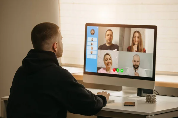 A back view of a man during a video call — Stock Photo, Image