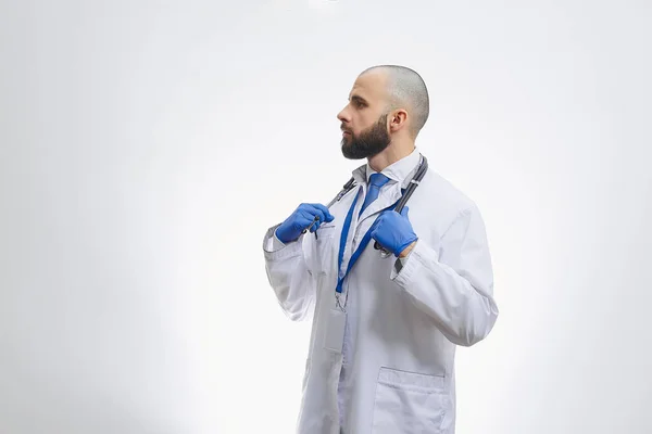 Doctor Disposable Medical Gloves Holding Stethoscope Bald Physician Beard Preparing — Stock Photo, Image