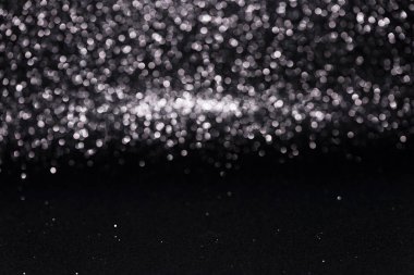 Ufuk soyut siyah glitter bokeh arka plan ile