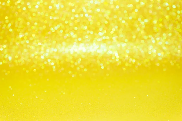 Brillo amarillo abstracto desenfocado con fondo bokeh — Foto de Stock