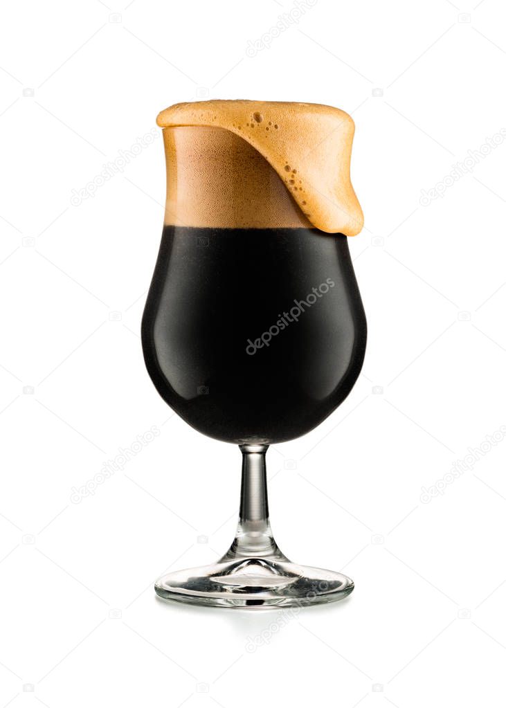Glass of dark beer isolated on white background