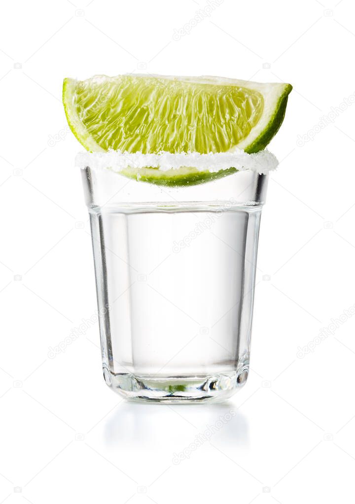 Tequila Glass Shot With Lime Slice and Salty Rim, Isolated on White Background With Clipping Path