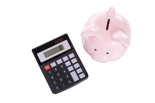 Isolated piggy bank and calculator — Stock Photo, Image