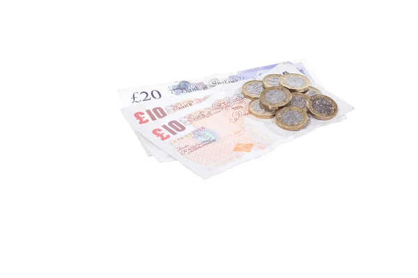 Montón aislado de libras esterlinas en efectivo sobre blanco — Foto de Stock