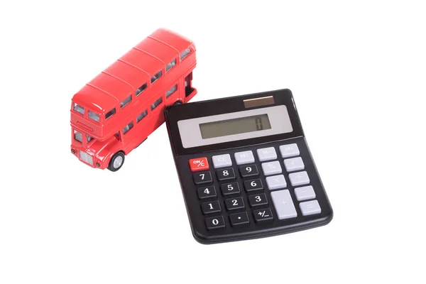 Modelo de um autocarro vermelho de dois andares e calculadora — Fotografia de Stock