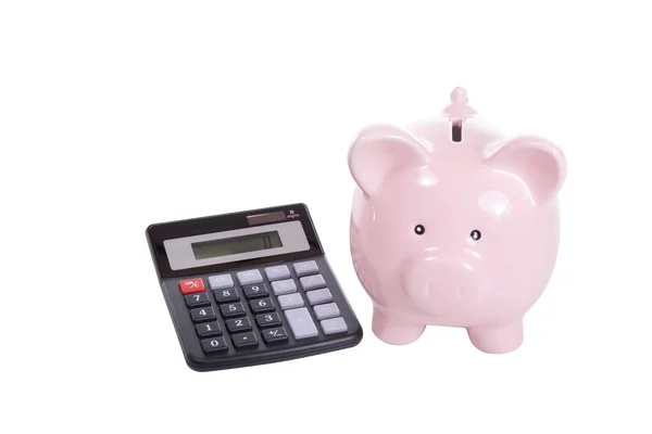 Banco piggy rosa cerâmico e calculadora — Fotografia de Stock