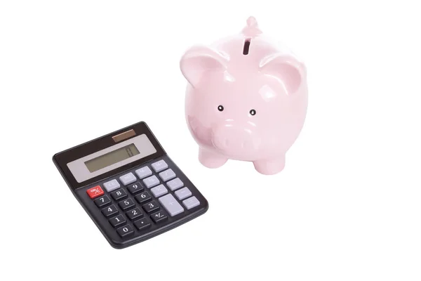 Pequeno banco piggy rosa com calculadora em branco — Fotografia de Stock