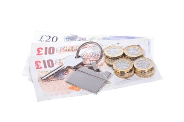 Çok para bir etiketteki bir evin anahtarı ile