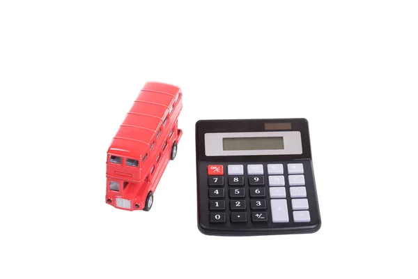 Brinquedo vermelho de dois andares ônibus britânico e calculadora — Fotografia de Stock