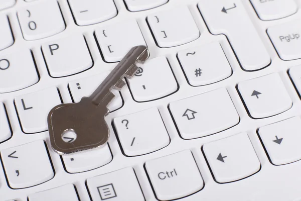 Metal key on computer keyboard