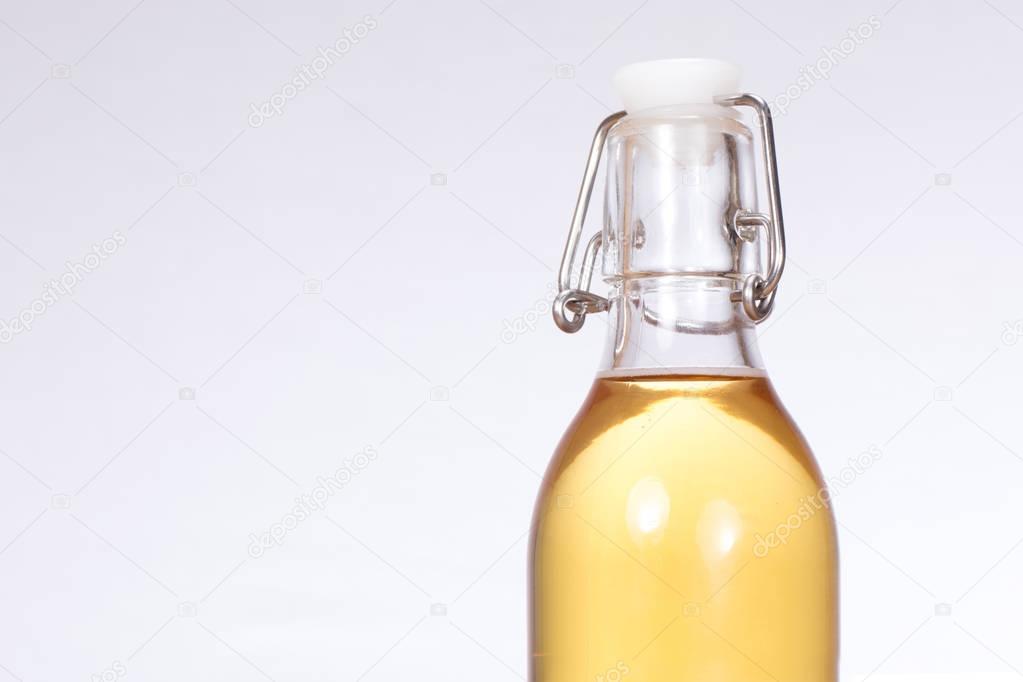 Beer in glass lever bottle with white copy space