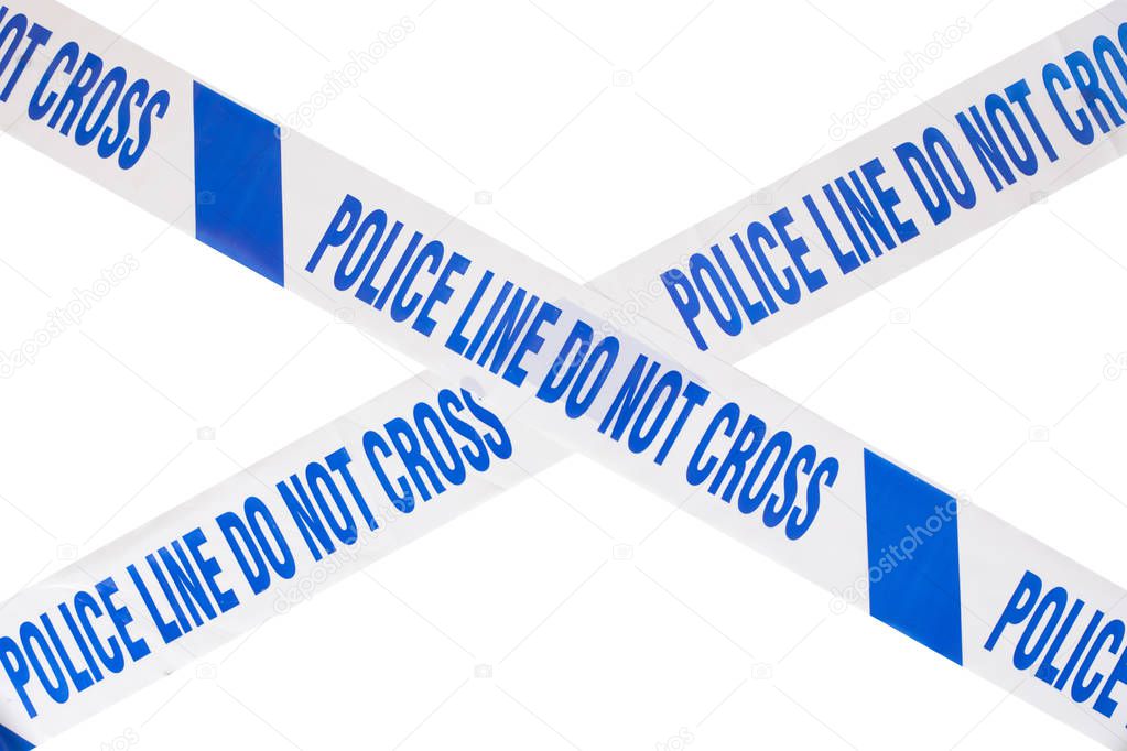 Police crime scene tape cross and white copy space