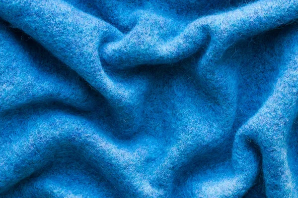 Textur aus blauem Wollstoff — Stockfoto