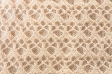 Beyaz yün kumaş desen doku ile.