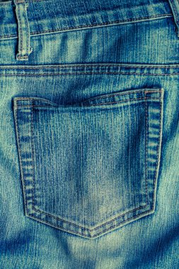 Eski mavi kot pantolon dikişleri ile cep.