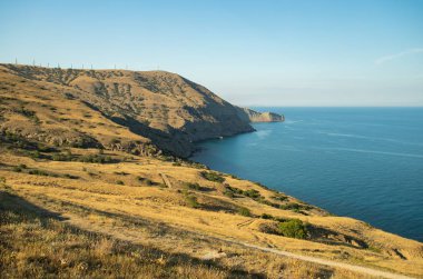Beautiful Landscape At Cape Meganom And On Background Wind Farm 