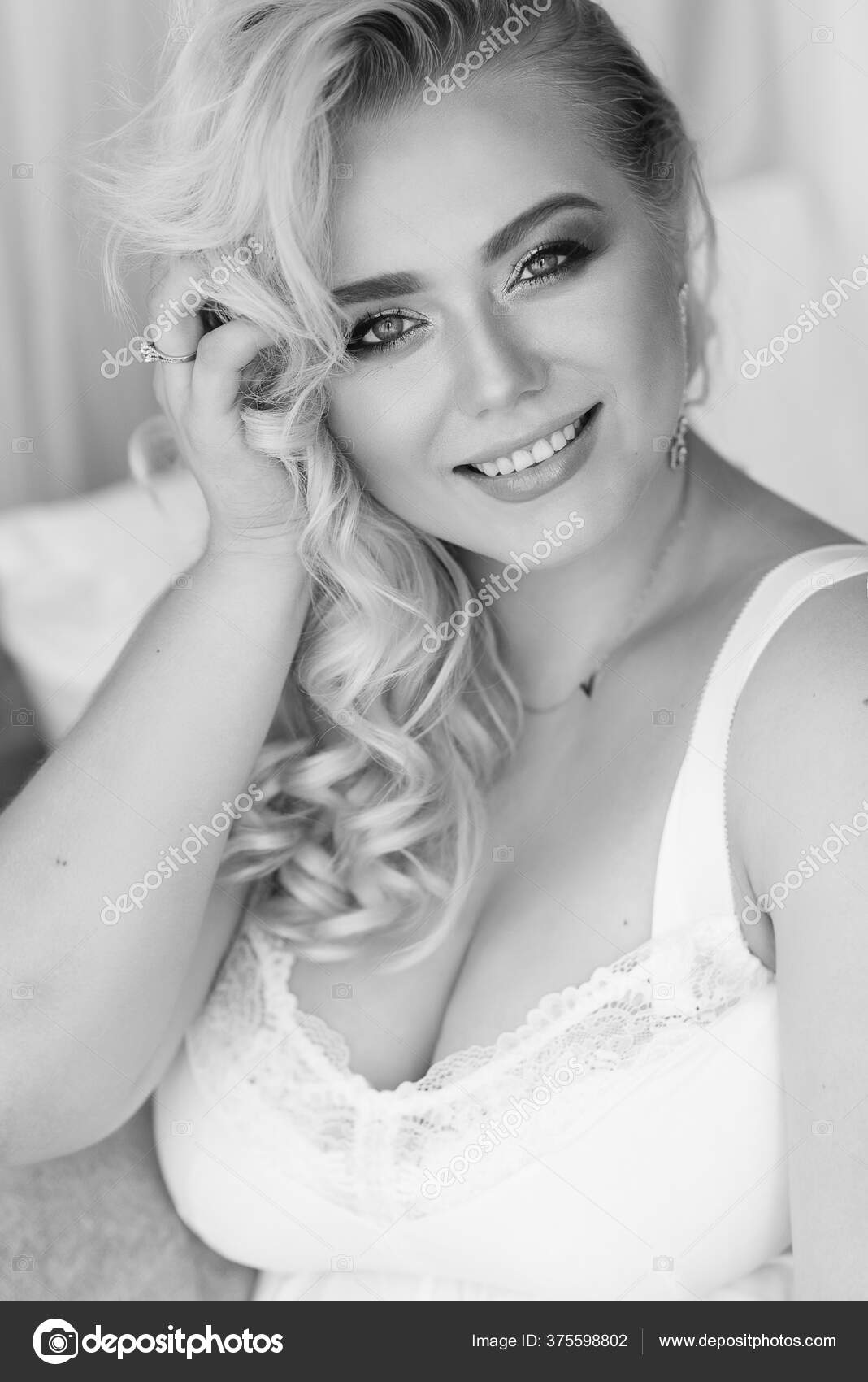 blonde girl plus size model in white lingerie portrait Bali