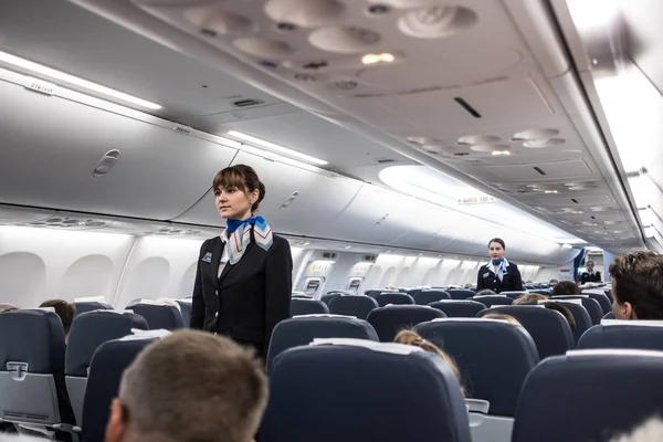 Safety briefing on board an aircraft — Stock Photo, Image