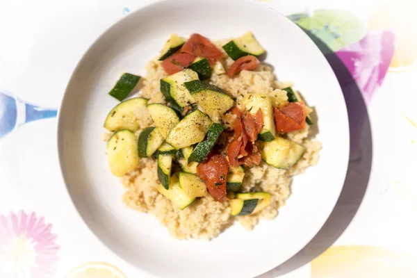 Vegan Couscous Dish with Zucchini and Tomato