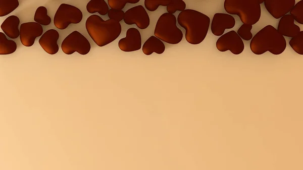 Φόντο με σοκολάτα καρδιές σε ένα υπόβαθρο καραμελόχρωμα — Φωτογραφία Αρχείου
