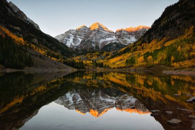 Maroon bells peak sunrise Aspen Fall Colorado clipart