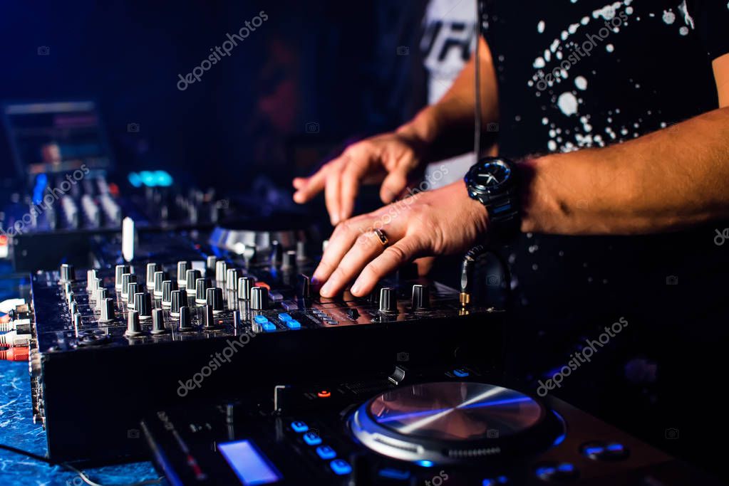 DJ mix music in a professional music boards and equipment — Stock Photo