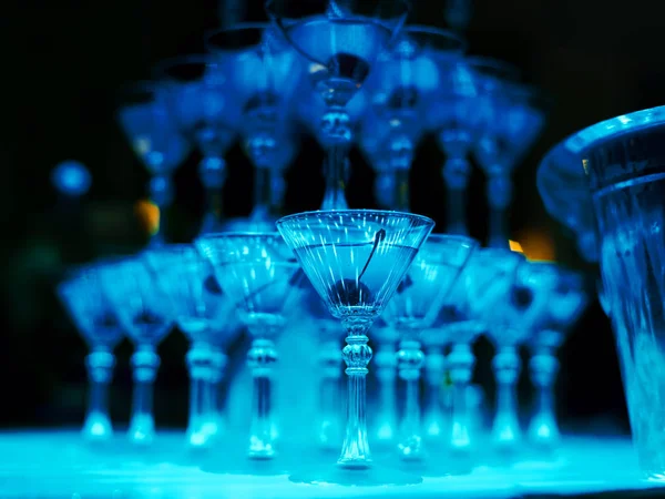 Tower of cocktail glasses for the bartender show closeup — Stock Photo, Image