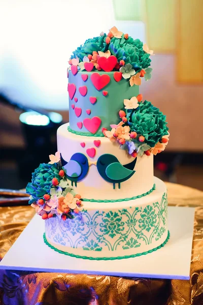 Wedding cake with three tiers of white blue glaze — Stock Photo, Image
