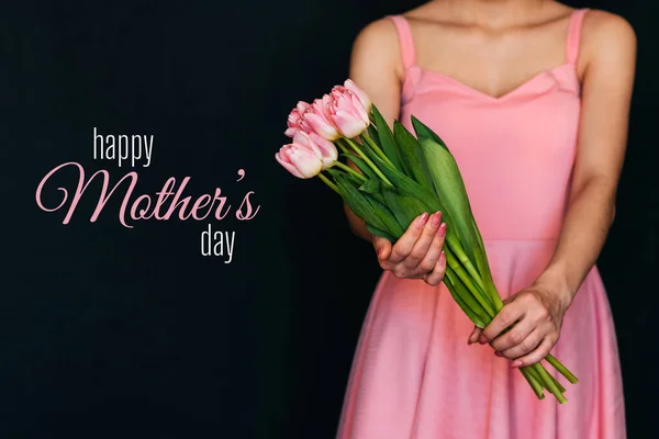 Gratulationskort med inskriptionen Happy Mothers Day. Bukett med rosa tulpaner — Stockfoto