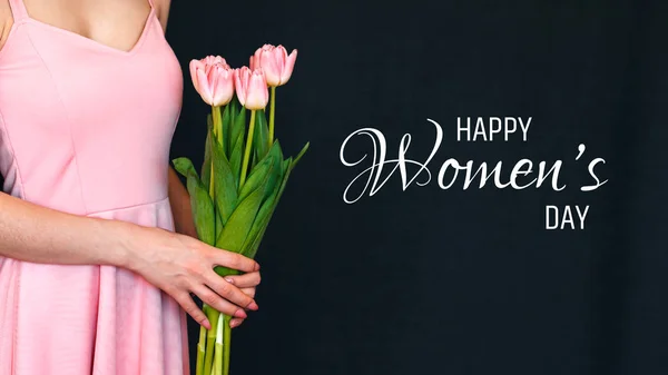 Greeting card with the inscription Happy Womens Day. Pink tulips — Stok fotoğraf