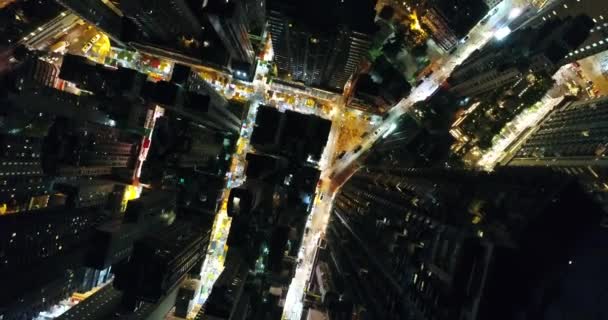 AERIAL. Brid eyes view from drone of Hong Kong city at night time — Stock Video