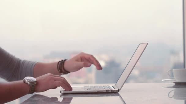 Close up male hands typing on keyboard of computer laptop, work from home and self quarantine concept, prevent spread of pandemic Covid-19 and Coronavirus — Stock Video