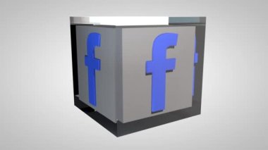 Editoryal animasyon: 3d döndürme Facebook amblem küpü