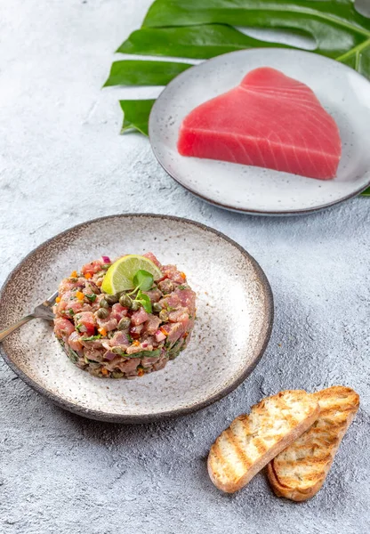 Tuna fish TARTAR tartare on gray plate — Stock Photo, Image