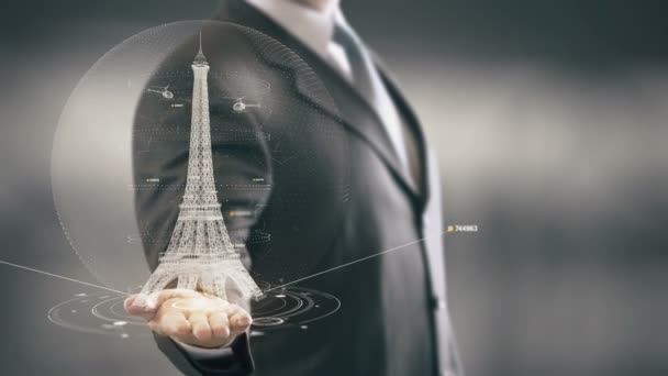 Tour Eiffel Homme d'affaires tenant dans la main Repère Nouvelles technologies — Video