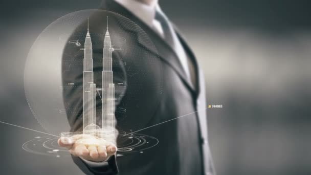 Petronas Towers Imprenditore holding in mano Punto di riferimento Nuove tecnologie — Video Stock