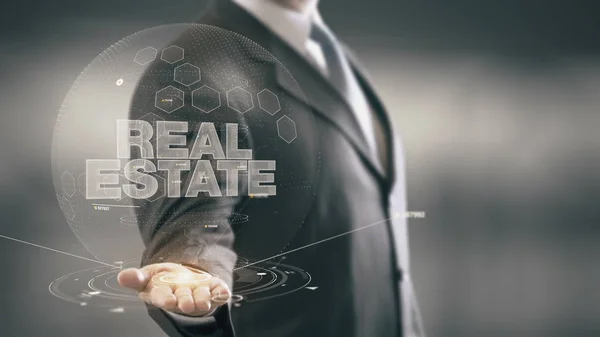 Real Estate zakenman Holding in Hand nieuwe technologieën — Stockfoto