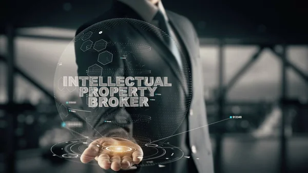 Intellectuele eigendom Broker met hologram zakenman concept — Stockfoto