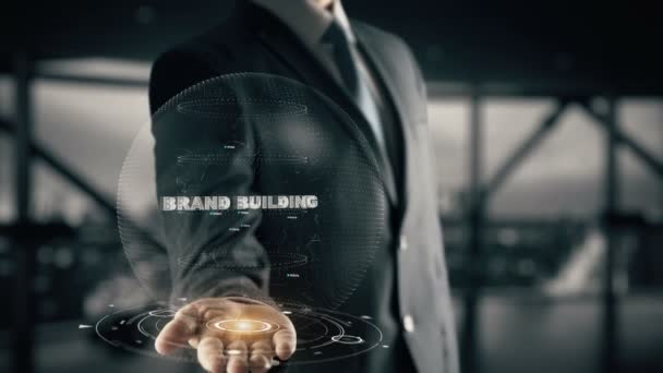 Construção de marca com holograma conceito de empresário — Vídeo de Stock