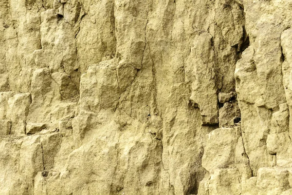 Sandstone and clay wall covered with erosion and cracks — Stock Photo, Image