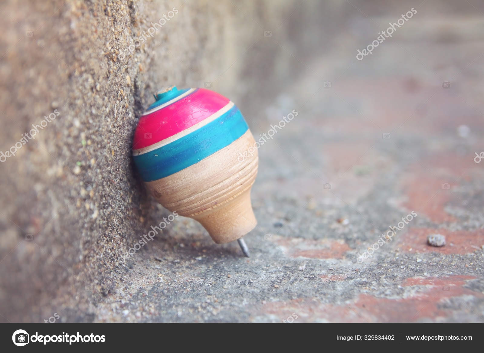 spinning top toy with string